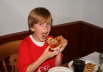 Matthew about to eat his pizza