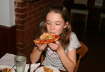 Hayley enjoying her pizza